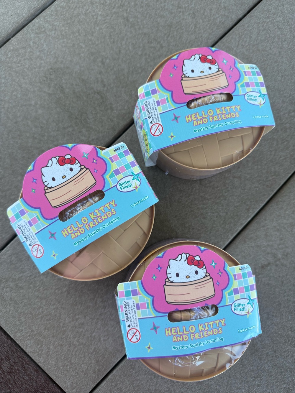 Hello Kitty Squishy Dumpling Toy - Pink, Blue & Tan Packaging